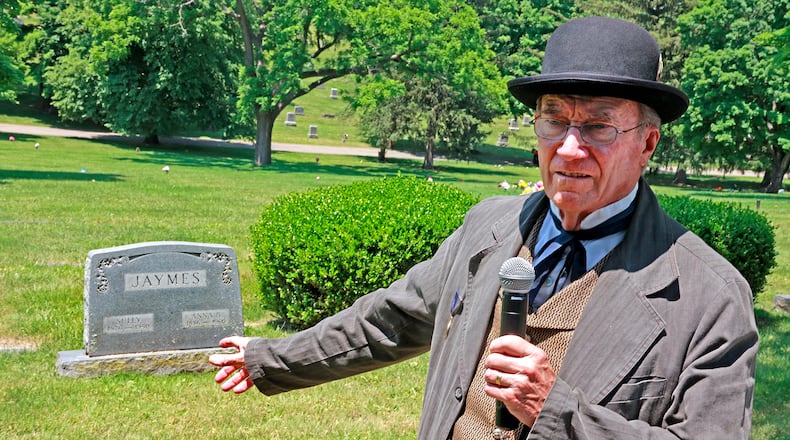 Paul "Ski" Schanher stops by the grave of Sully Jaymes, an influential Black lawyer in the early 1900s, Thursday, June 1, 2023, at Ferncliff Cemetery and Arboretum. Jaymes' grave is one of the stops on the tour Schanher will lead focusing on graves of local African-Americans in the cemetery. BILL LACKEY/STAFF
