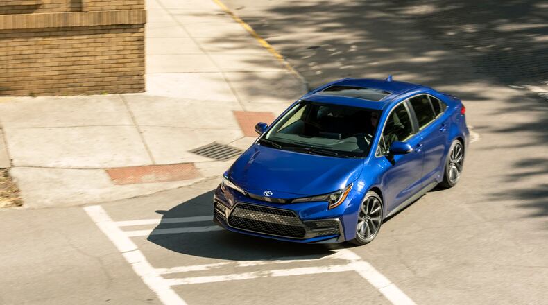 This photo from Toyota shows the Corolla sedan. It's not as enjoyable to drive as the Civic but is otherwise strong on value. (Toyota via AP)