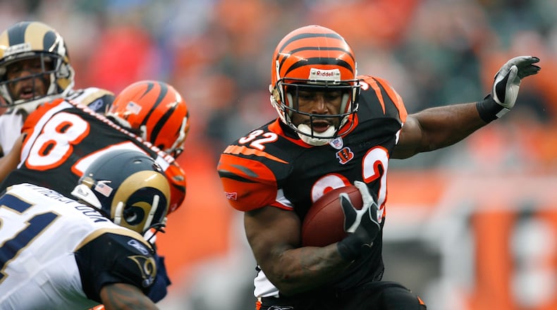 Former Bengals halfback Rudi Johnson, ranked by fans and media as the No. 21 retired Cincinnati player, is see here picking on the Rams in a 2007 game at Paul Brown Stadium.