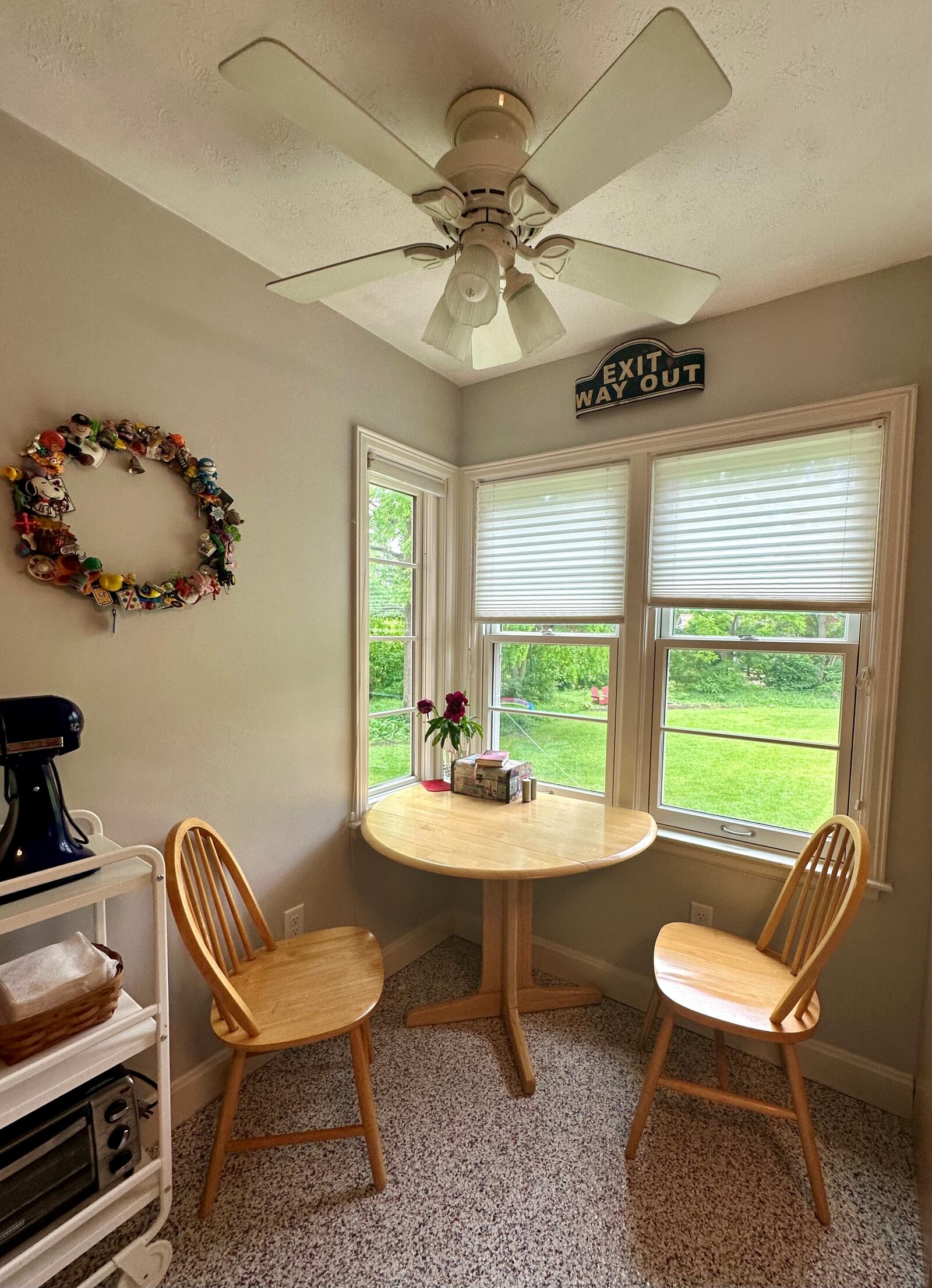 The corner of the Crowes' kitchen in Tipp City overlooks the backyard. ROBIN McMACKEN / STAFF 