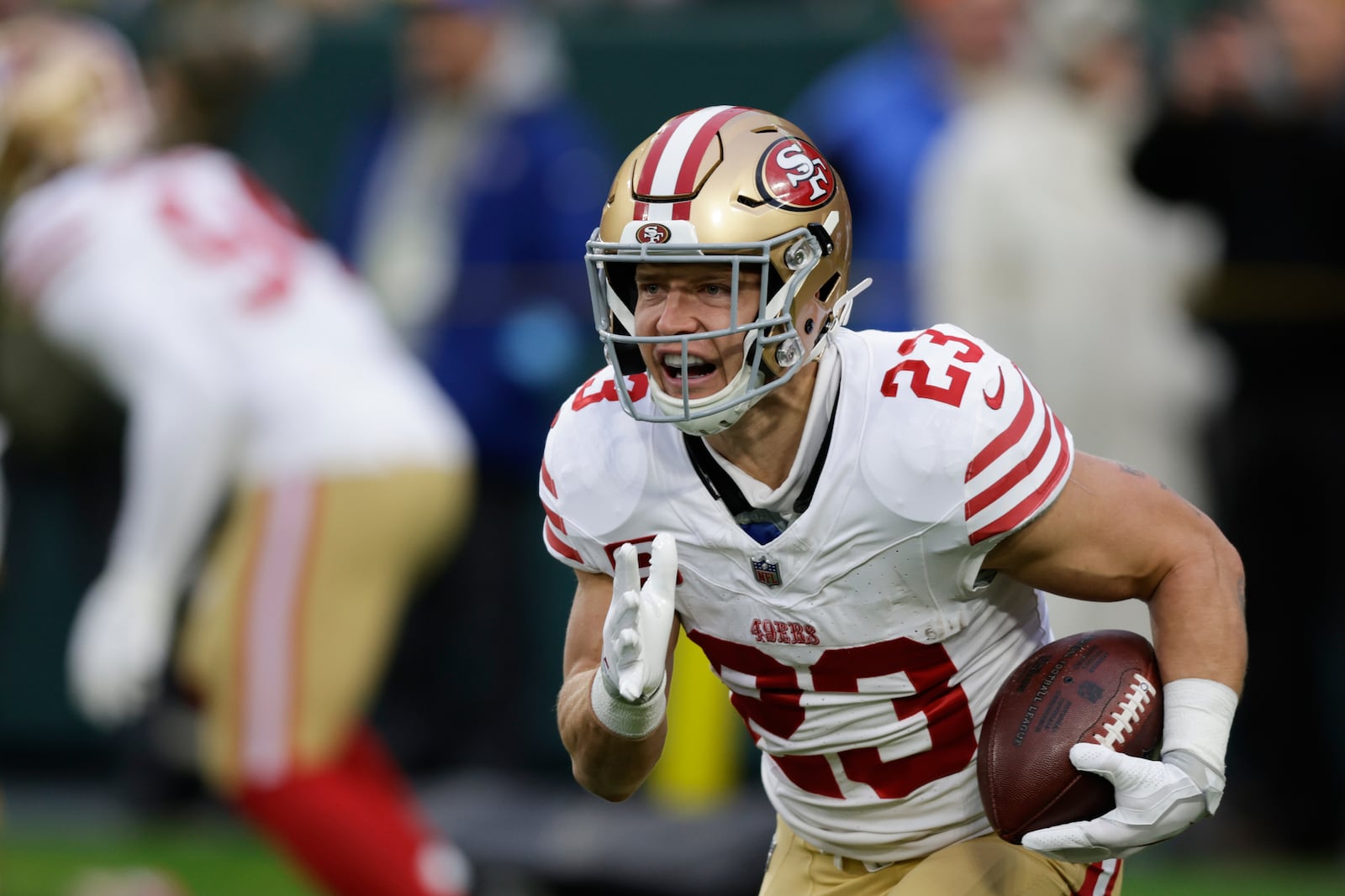 FILE - San Francisco 49ers running back Christian McCaffrey (23) warms up before an NFL football game against the Green Bay Packers on Sunday, Nov. 24, 2024 in Green Bay, Wis. (AP Photo/Matt Ludtke, File)