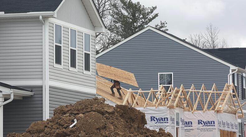 Houses are still being built Friday, April 8, 2022 in the Bridgewater development in Springfield Township. BILL LACKEY/STAFF