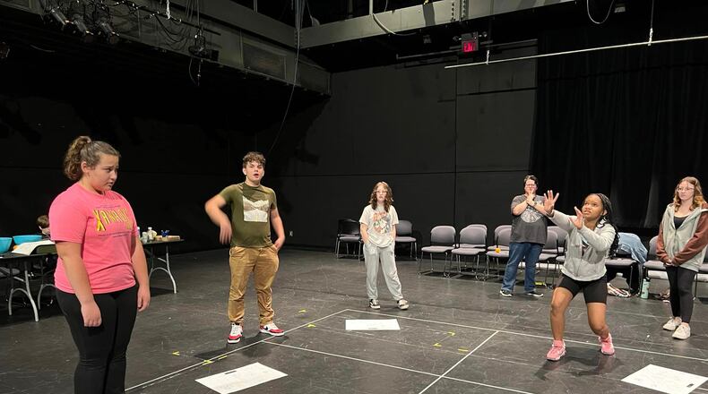 Members of the cast of the Clark State Theatre Arts Program's upcoming production of the Tony Award-winning drama "The Crucible" rehearse in the Turner Studio Theatre at the Clark State Performing Arts Center. The show will include several unique touches when it's presented Oct. 27-29 and Nov. 3-5.