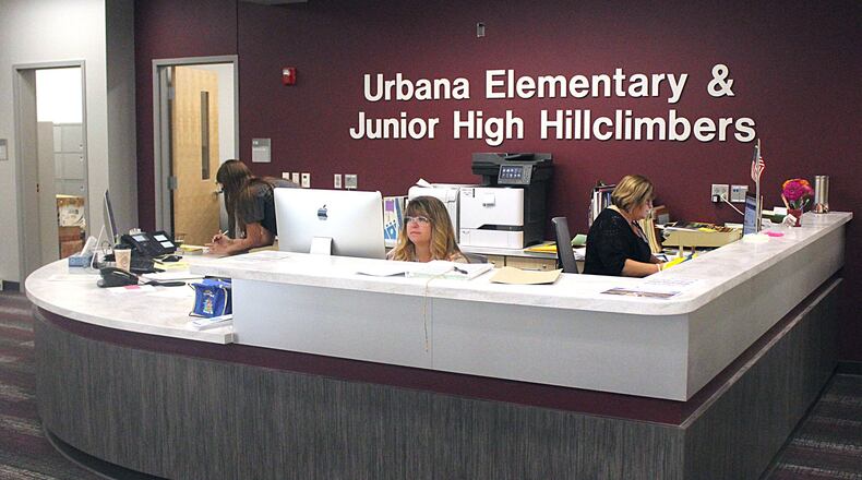 Staff work in the office area at Urbana Elementary and Junior High School. JEFF GUERINI/STAFF