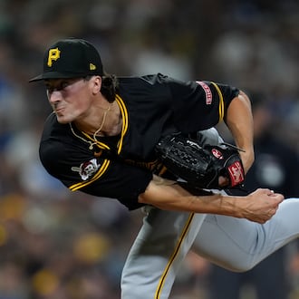 Pittsburgh Pirates relief pitcher Kyle Nicolas works against a San Diego Padres batter during the eighth inning of a baseball game Tuesday, Aug. 13, 2024, in San Diego. (AP Photo/Gregory Bull)