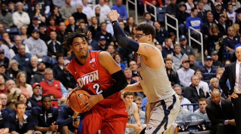 Dayton's Jalen Robinson drives past a Xavier defender during the first half on Wednesday, Jan. 30, 2013.