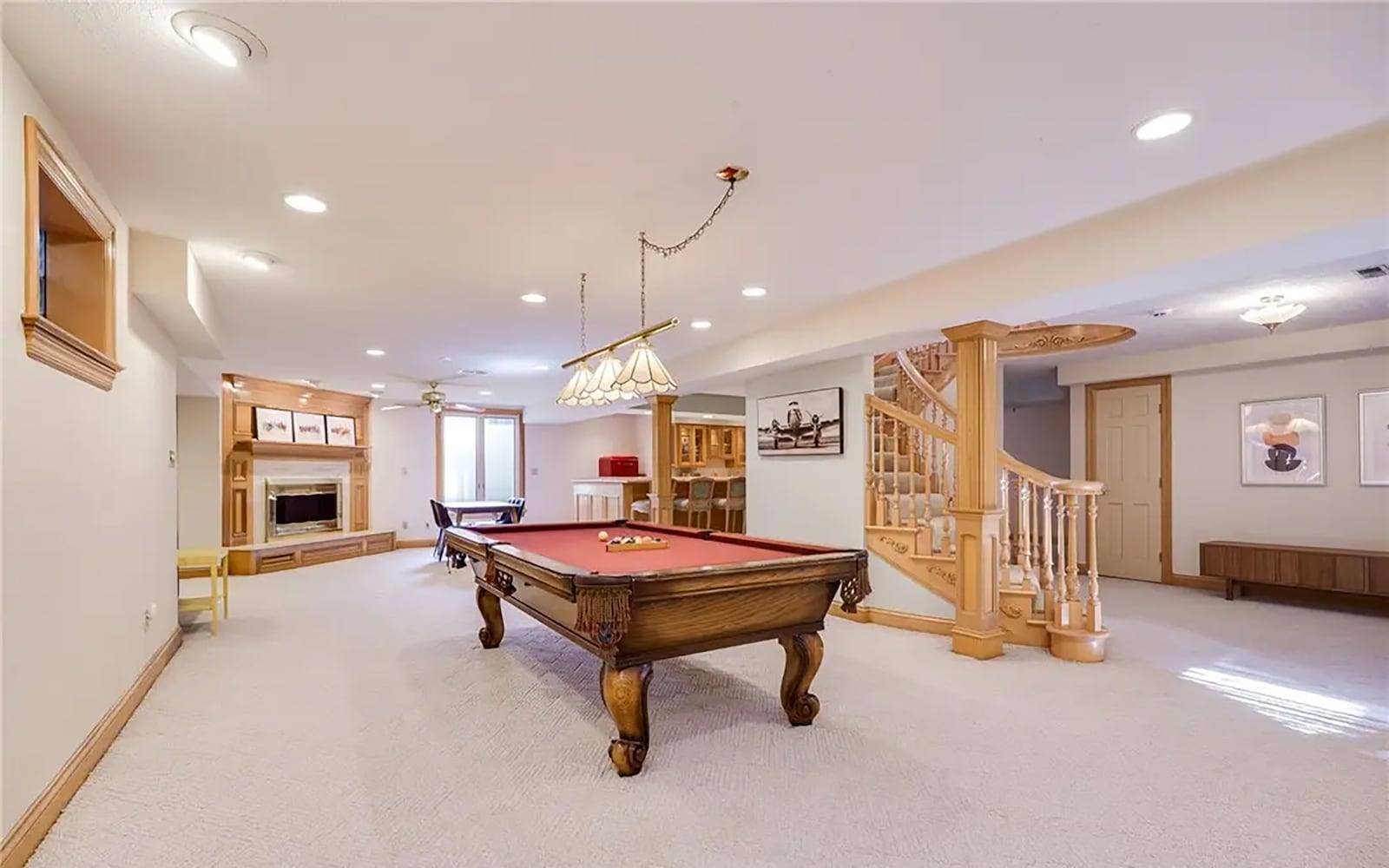 The finished basement features a recreation room with fireplace, wet bar/kitchenette with bar seating and a flex room/bedroom with an ensuite bathroom. CONTRIBUTED