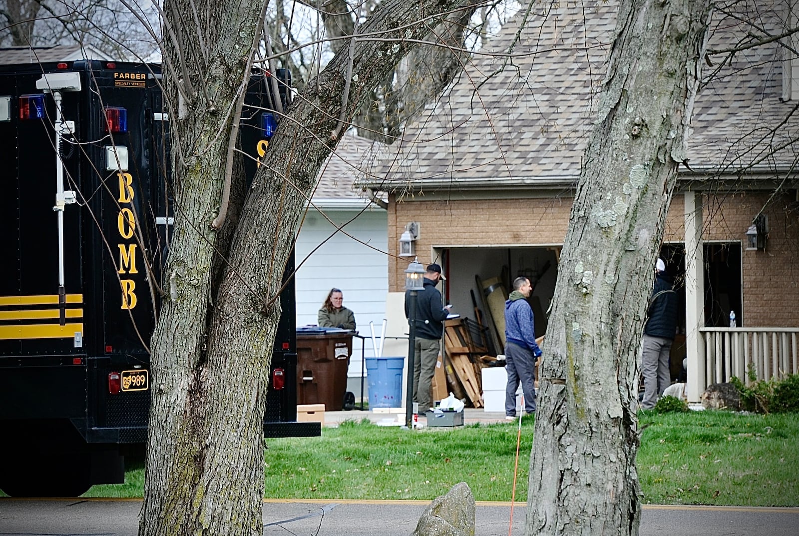 Several bomb squad, including Dayton and Franklin county at a home in Troy on Barnhart Rd., Friday April 5, 2024. MARSHALL GORBY \STAFF
