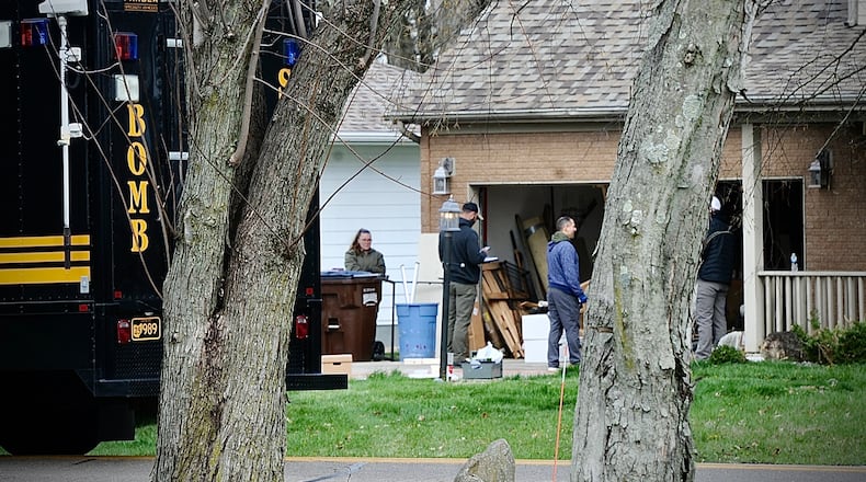 Several bomb squad, including Dayton and Franklin county at a home in Troy on Barnhart Rd., Friday April 5, 2024. MARSHALL GORBY \STAFF