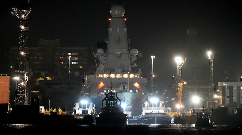 Royal Navy Type 45 destroyer HMS Dragon at the HM Naval Base, in Portsmouth Harbour, in Hampshire, England, Tuesday March 3, 2026, ahead of being deployed to protect British military personnel in Cyprus. (Andrew Matthews/PA via AP)