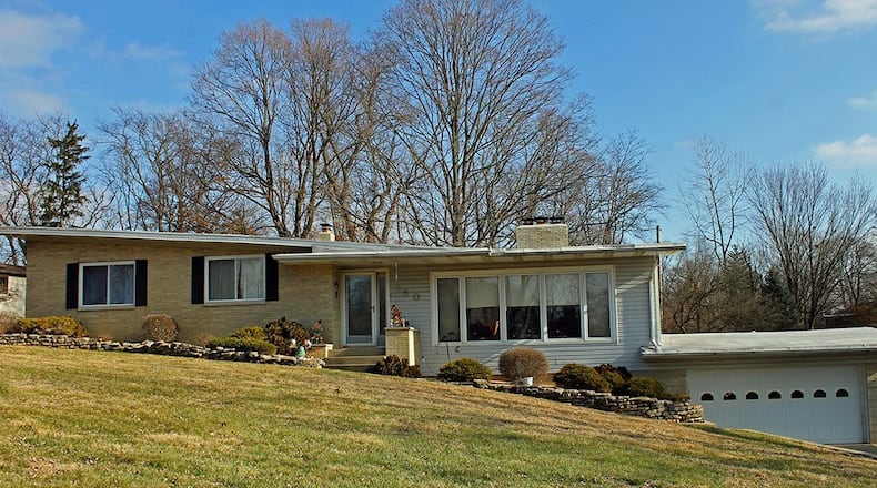 Situated on .54 acres, this 3-bedroom house boasts approximately 2,710 sq. ft. of living space. It includes an attached, 2-car garage. CONTRIBUTED PHOTO BY VICKIE KAPNAS