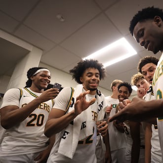 The Wright State University men's basketball team celebrates after beating Northern Kentucky University in a Horizon League semifinal game on Monday, March 9, 2026 at Corteva Coliseum in Indianapolis. HORIZON LEAGUE / CONTRIBUTED PHOTO