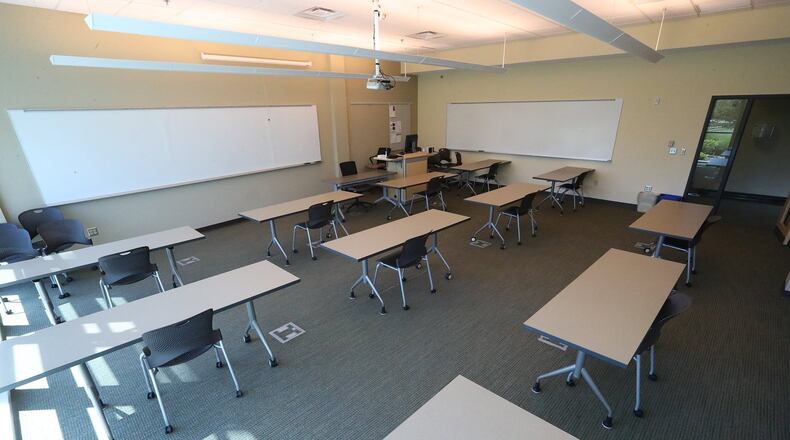 The seating in the Clark State classrooms has been reduced so students can be spaced apart. BILL LACKEY/STAFF
