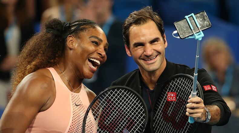 PERTH, AUSTRALIA - JANUARY 01: Serena Williams of the United States and Roger Federer of Switzerland take a selfie following their mixed doubles match during day four of the 2019 Hopman Cup at RAC Arena on January 01, 2019 in Perth, Australia. (Photo by Paul Kane/Getty Images)