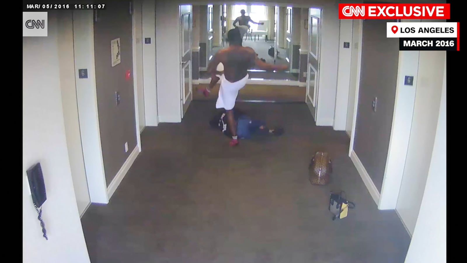 FILE - This frame grab taken from hotel security camera video and aired by CNN appears to show Sean "Diddy" Combs attacking singer Cassie in a Los Angeles hotel hallway in March 2016. (Hotel Security Camera Video/CNN via AP, file)