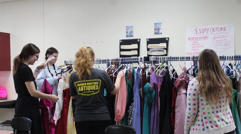 Tecumseh High School English teacher Mackenzie Krapfel spent the last month collecting dresses for girls that needed them for prom. Contributed