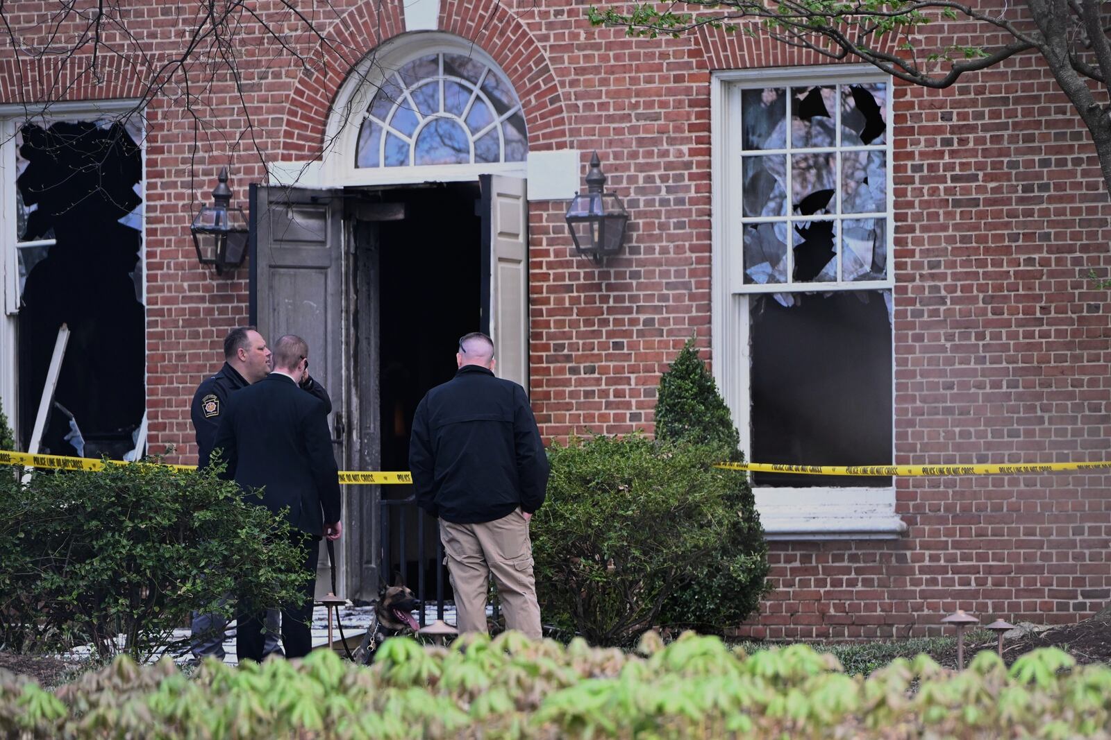Investigators are on the scene after an overnight fire at the governor’s official residence on Sunday, April 13, 2025 in Harrisburg, Pa. (AP Photo/Marc Levy)