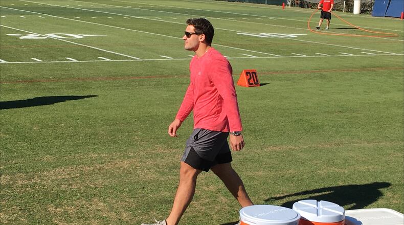 Nick Bosa walks into practice