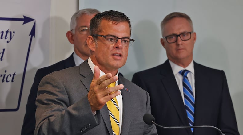 Andy Wilson, director of the Ohio Department of Public Safety, talks about the Ohio State Troopers that have been placed in the Springfield City Schools Thursday, Sept. 26, 2024 during a press conference. BILL LACKEY/STAFF