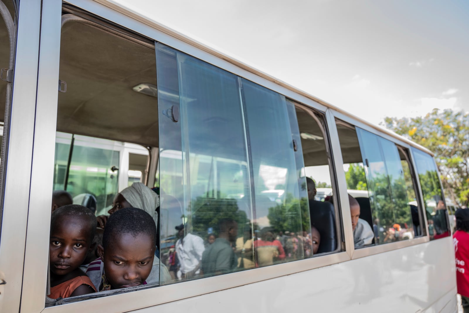 Rwandan refugees who were living in eastern Congo since the 1994 Rwanda genocide are repatriated by bus from Goma, Democratic Republic of the Congo, on Saturday, May 17, 2025. (AP Photo/Moses Sawasawa)