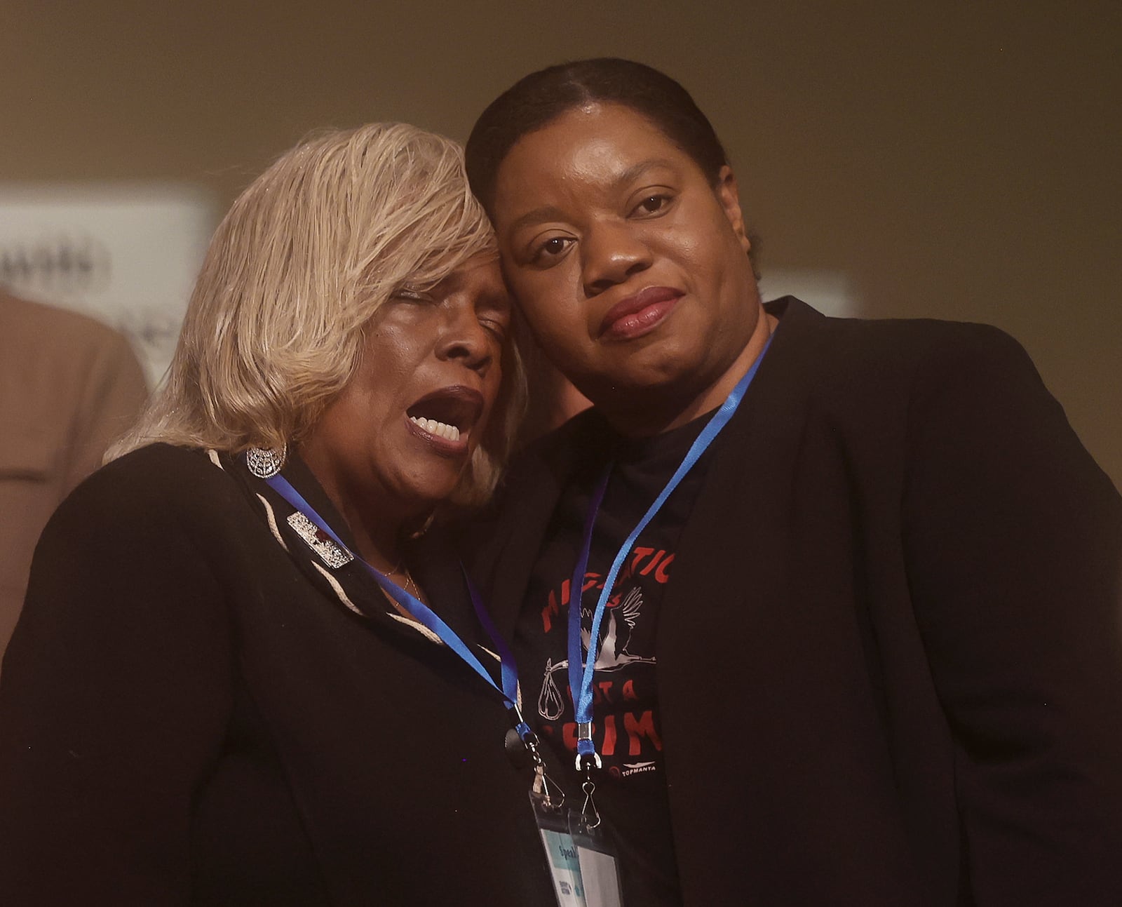 Springfield NAACP President Denise Williams, left, comforts, Geurline Jozef, founder of the Haitian Bridge Alliance, as music plays during Here We Stand: Faith Leaders for Immigration Justice & Family Unity at St. John Missionary Baptist Church on Monday, Feb. 2, 2026, in Springfield. Pastors and community members gathered to pray and call for the extension of Temporary Protected Status which is scheduled to expire on Tuesday, Feb. 3, 2026. JOSEPH COOKE/STAFF