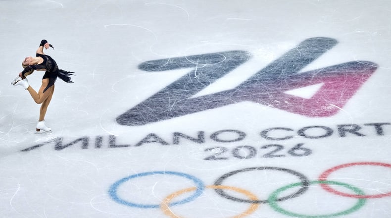 Amber Glenn of the United States competes during the figure skating women's team event at the 2026 Winter Olympics, in Milan, Italy, Sunday, Feb. 8, 2026. (AP Photo/Natacha Pisarenko)