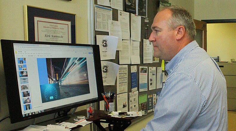 Graham Superintendent Kirk Koennecke works at his desk.