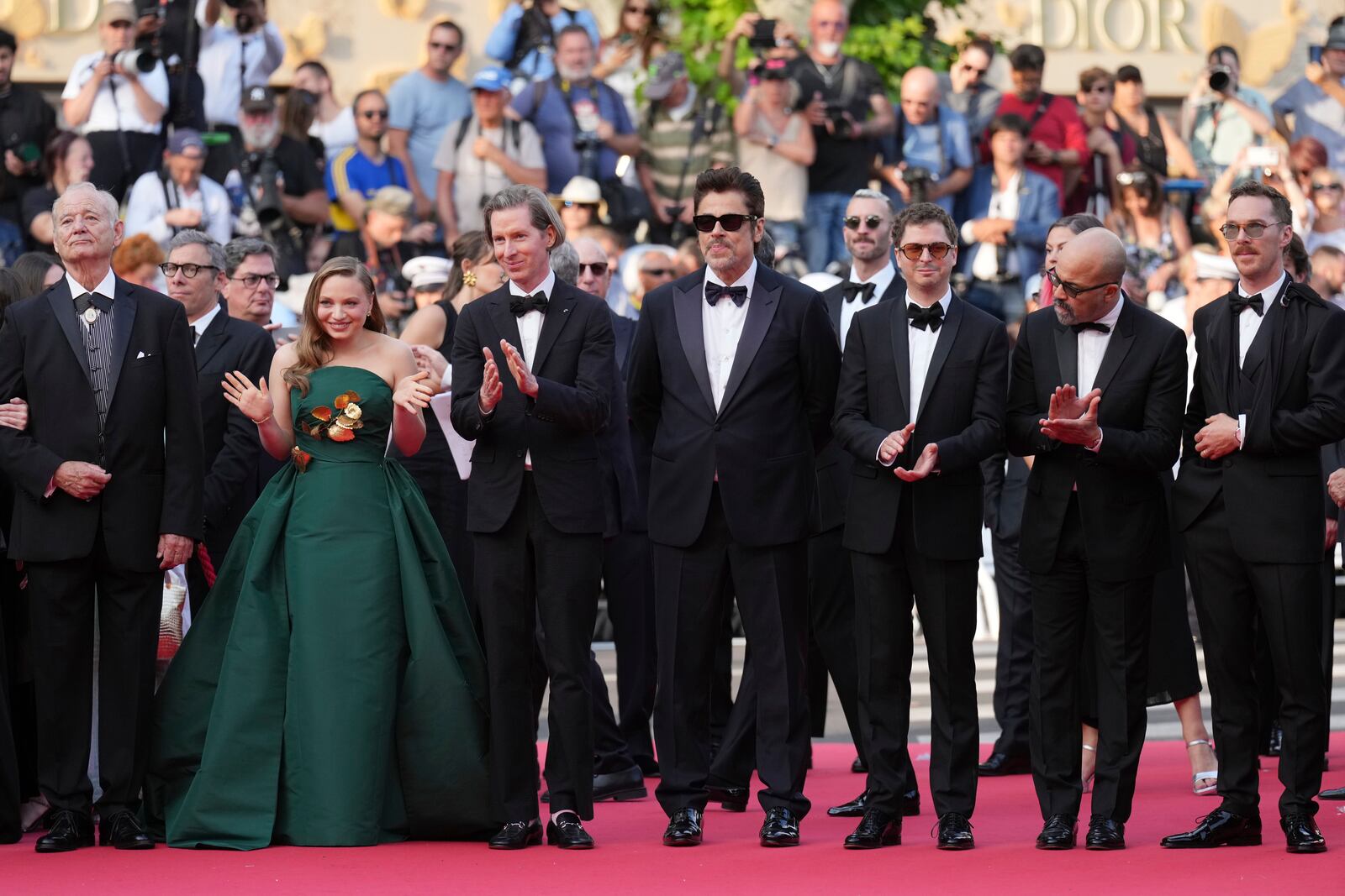 Bill Murray, from left, Mia Threapleton, director Wes Anderson, Benicio del Toro, Michael Cera, Jeffrey Wright and Benedict Cumberbatch pose for photographers upon arrival at the premiere of the film 'The Phoenician Scheme' at the 78th international film festival, Cannes, southern France, Sunday, May 18, 2025. (AP Photo/Natacha Pisarenko)