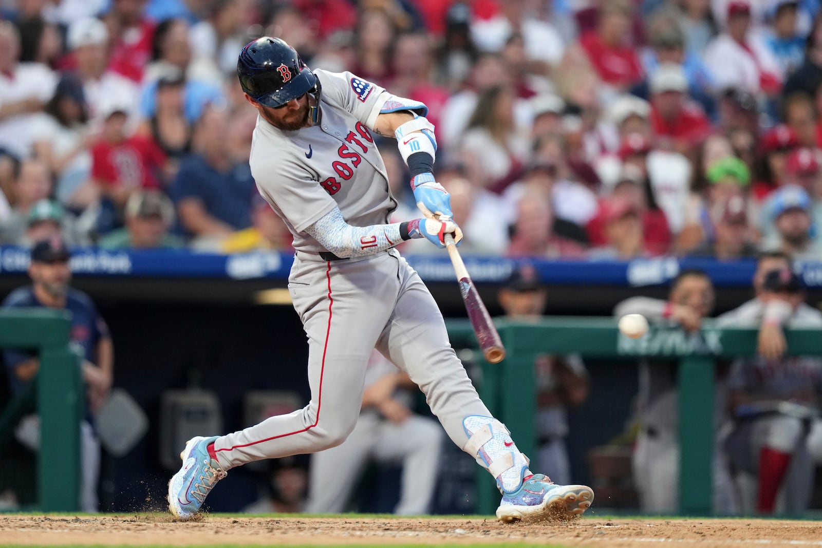 Boston Red Sox's Trevor Story hits a run-scoring single agains tPhiladelphia Phillies pitcher Zack Wheeler during the sixth inning of a baseball game Monday, July 21, 2025, in Philadelphia. (AP Photo/Matt Slocum)