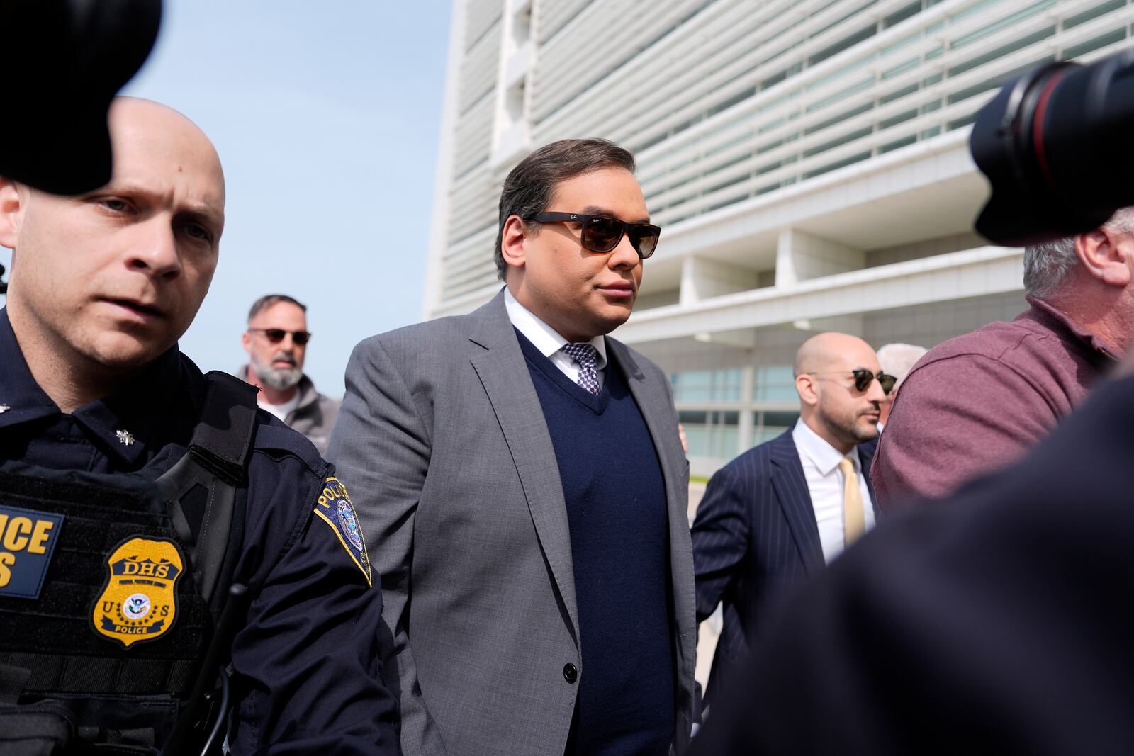 Former U.S. Rep. George Santos arrives at federal court for sentencing, Friday, April 25, 2025, in Central Islip, N.Y. (AP Photo/Julia Demaree Nikhinson)