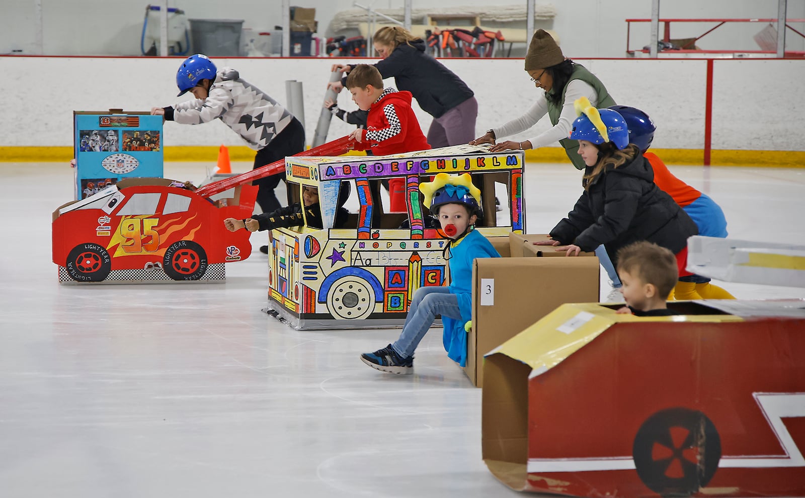 Competitors blasted off the starting line during the Cardboard Classic Bobsled Races at The Chiller ice skating rink March 9, 2024. The Wrights were dressed as "The Simpsons" and their bobsled was a cardboard couch. The annual event is sponsored by the National Trail Parks and Recreation District and the Clark County Park District. BILL LACKEY/STAFF