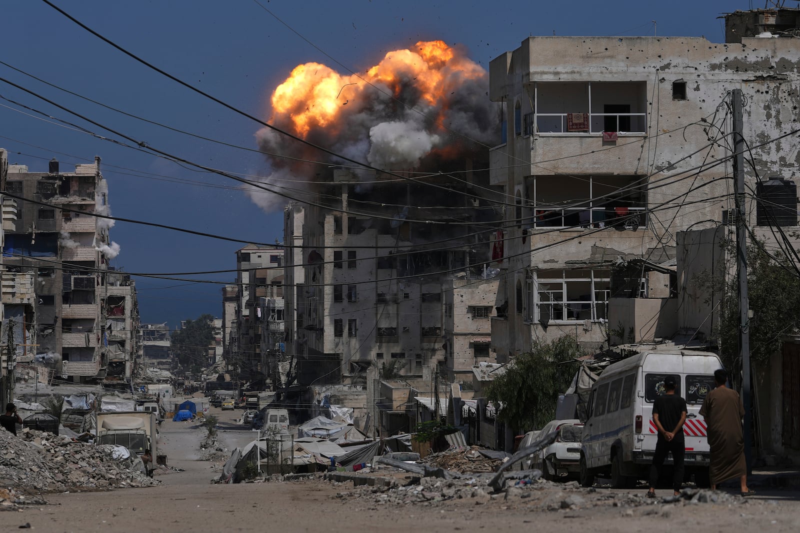 Smoke and flames erupt from an Israeli airstrike in Gaza City, Monday, July 21, 2025. (AP Photo/Jehad Alshrafi)