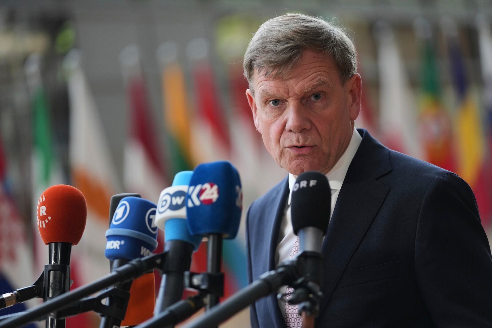 Germany's Foreign Minister Johann Wadephul speaks with the media as he arrives for a meeting of EU foreign ministers at the European Council building in Brussels, Belgium, Tuesday, May 20, 2025. (AP Photo/Virginia Mayo)