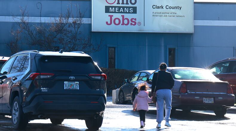 People enter the Clark County Department of Job and Family Services Thursday, Dec. 12, 2024. BILL LACKEY/STAFF