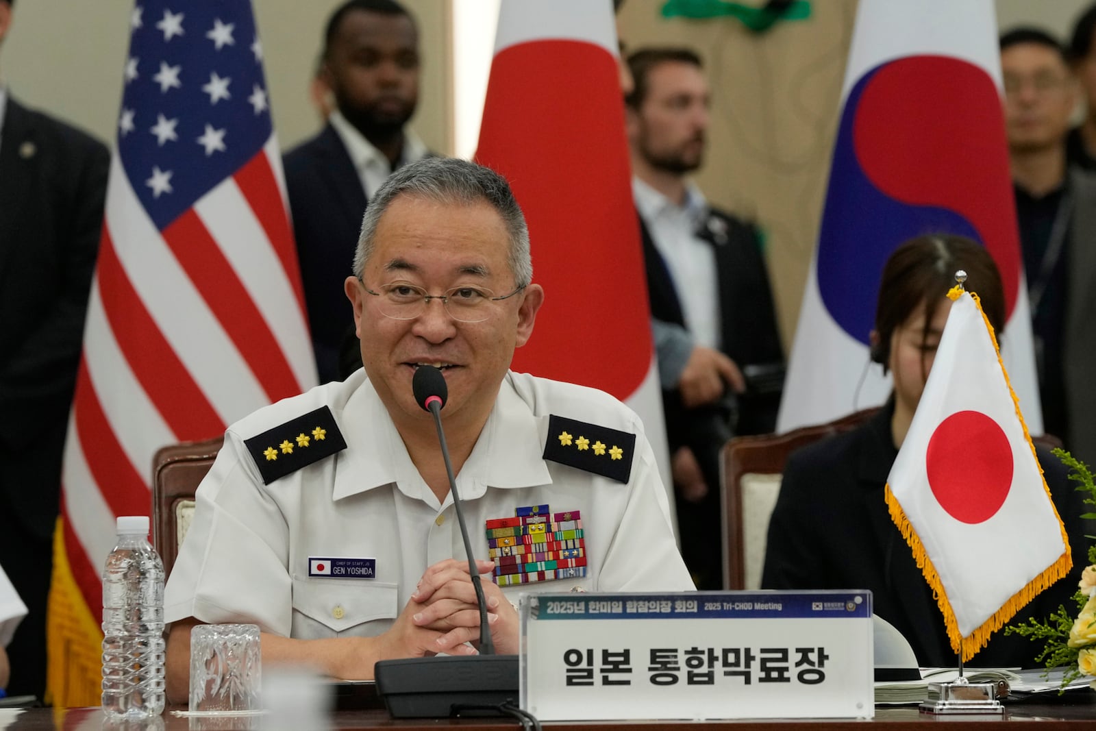 Gen, Yoshihide Yoshida, Chief of Staff, Joint Staff of Japan, speaks during a Trilateral Chiefs of Defense meeting with Adm. Kim Myung-soo, chairman of the South Korean Joint Chiefs of Staff, and John Daniel Caine, Chairman of the U.S. Joint Chiefs of Staff, (both are not in the picture) at the Defense Ministry in Seoul, South Korea, Friday, July 11, 2025. (AP Photo/Ahn Young-joon, Pool)