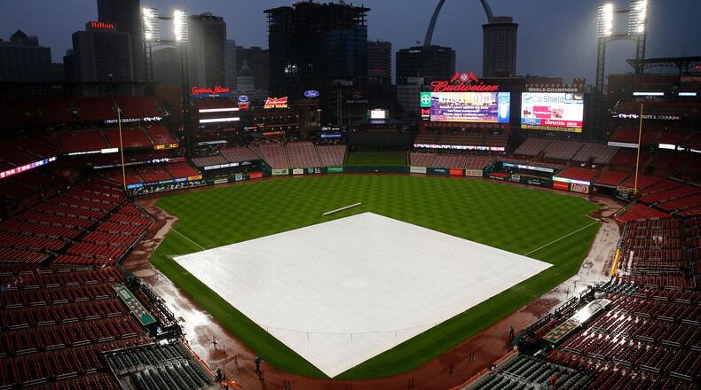ST LOUIS, MO - AUGUST 30: A general view of the tarp covering the field as the game between the St. Louis Cardinals and the Cincinnati Reds is cancelled due heavy rainfall at Busch Stadium on August 30, 2019 in St Louis, Missouri. (Photo by Dilip Vishwanat/Getty Images)