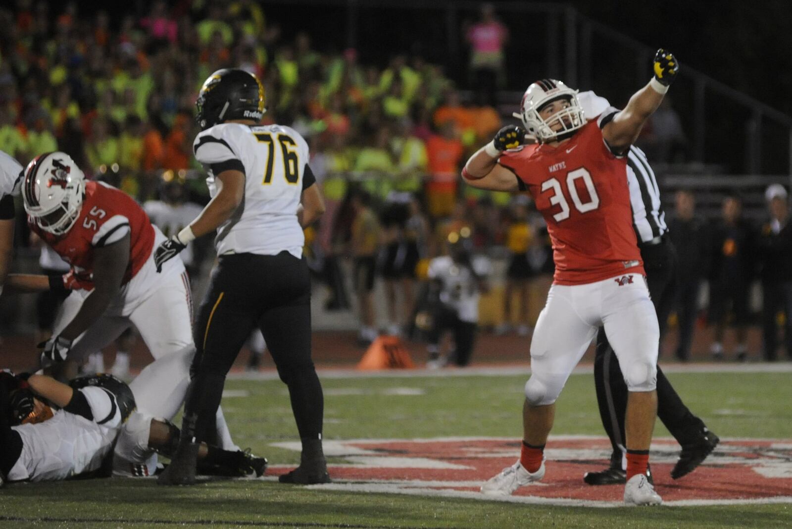 Wayne’s Alex Reigelsperger celebrates a stop. Centerville defeated host Wayne 39-22 in a Week 6 high school football game on Friday, Sept. 29, 2017. MARC PENDLETON / STAFF