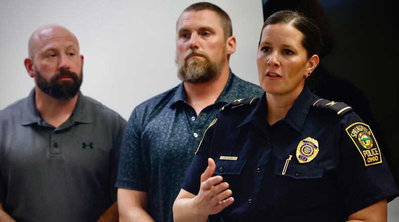 Springfield Police Chief Allison Elliott (right) speaks along with Deputy Director of Public Safety Jason Via and City Manager Bryan Heck at a press conference on a bomb threat to multiple locations across the city Thursday, Sept. 12, 2024. MARSHALL GORBY/STAFF