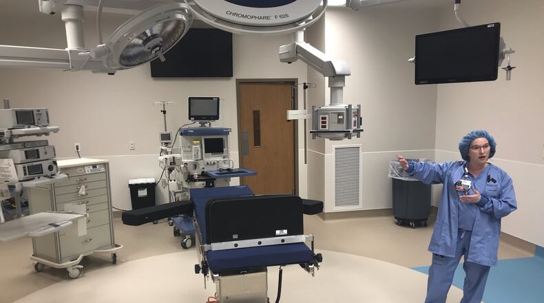 Jennifer Sherman, clinical nurse manager, stands in one of the new operating rooms at Kettering Health Network - Troy Hospital. KAITLIN SCHROEDER