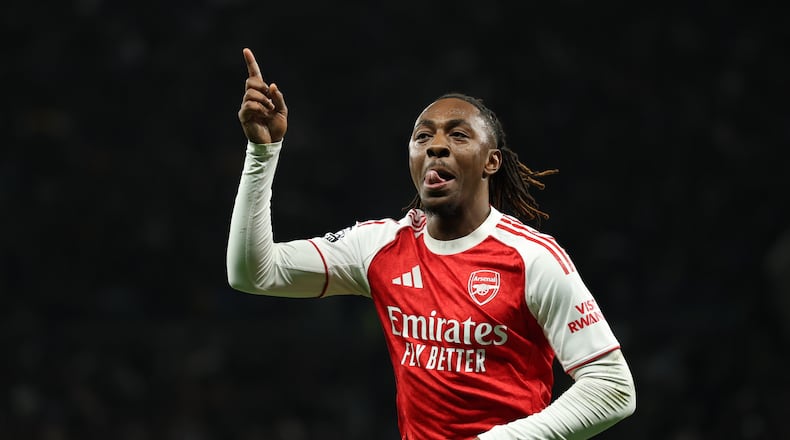 Arsenal's Eberechi Eze celebrates scoring his side's third goal during the English Premier League soccer match between Tottenham Hotspur and Arsenal in London, Sunday, Feb. 22, 2026.(AP Photo/Ian Walton)