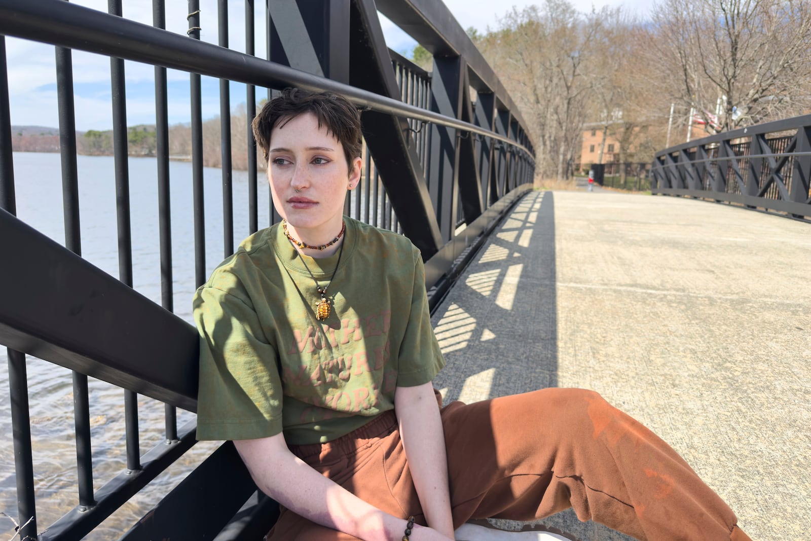 Julia Dupuis, one of 61 activists indicted on racketeering charges in connection with Atlanta's "Stop Cop City" movement, poses for a portrait in Worcester, Mass., on April 14, 2025. (AP Photo/Rodrique Ngowi)