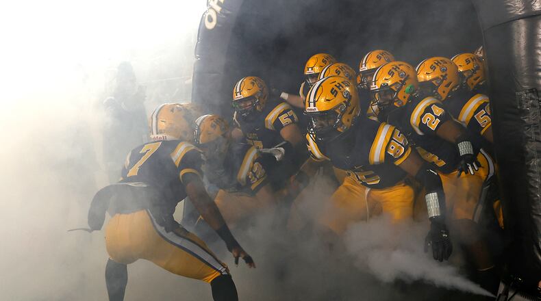The Springfield Wildcats take the field Friday, Dec. 1, 2023. BILL LACKEY/STAFF