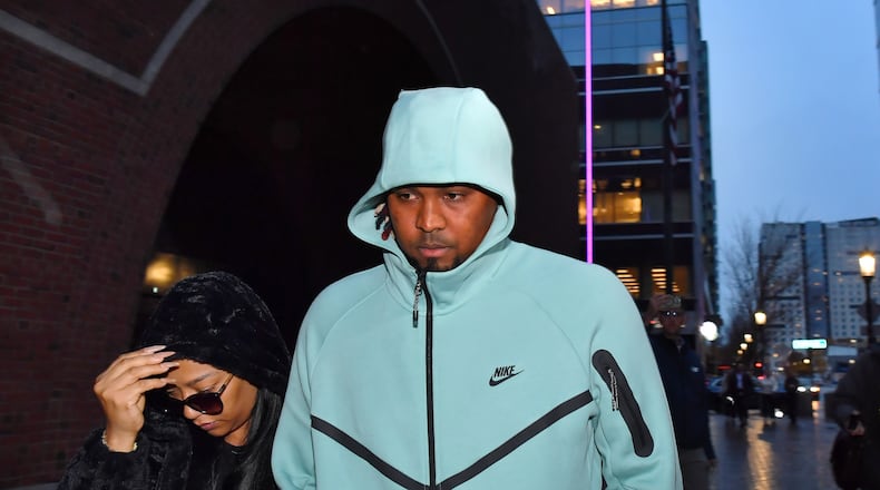Cleveland Guardians baseball pitcher Luis Ortiz, center, departs Federal Court following a hearing, Monday, Nov. 10, 2025, in Boston. (AP Photo/Steven Senne)