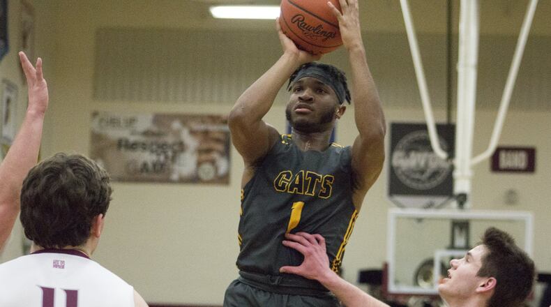 Springfield guard Larry Stephens shoots over Lebanon during the first half of Friday night’s 63-46 GWOC victory at Lebanon. Stephens scored seven points to help the Wildcats improve to 6-2 and 5-0 in the GWOC. Jeff Gilbert/CONTRIBUTED