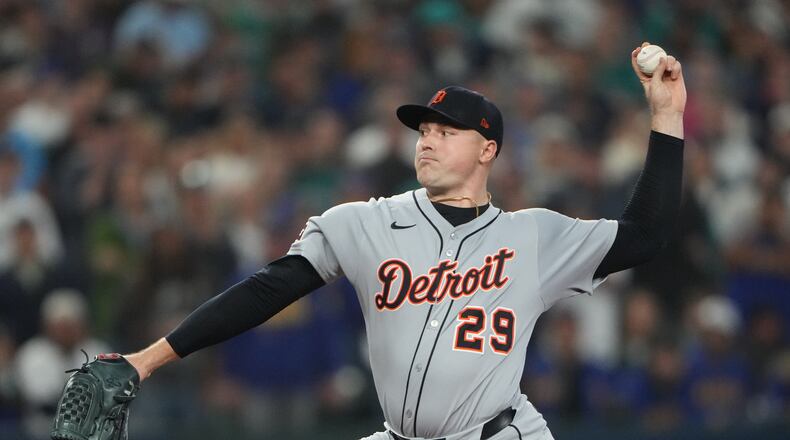FILE - Detroit Tigers pitcher Tarik Skubal throws during the first inning in Game 5 of baseball's American League Division Series against the Seattle Mariners, Friday, Oct. 10, 2025, in Seattle. (AP Photo/Lindsey Wasson, File)