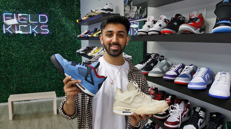 Paavan Patel in his new Springfield business, Field Kicks, a buy, sell and trade sneaker store located on North Plum Street Tuesday, April 9, 2024. BILL LACKEY/STAFF