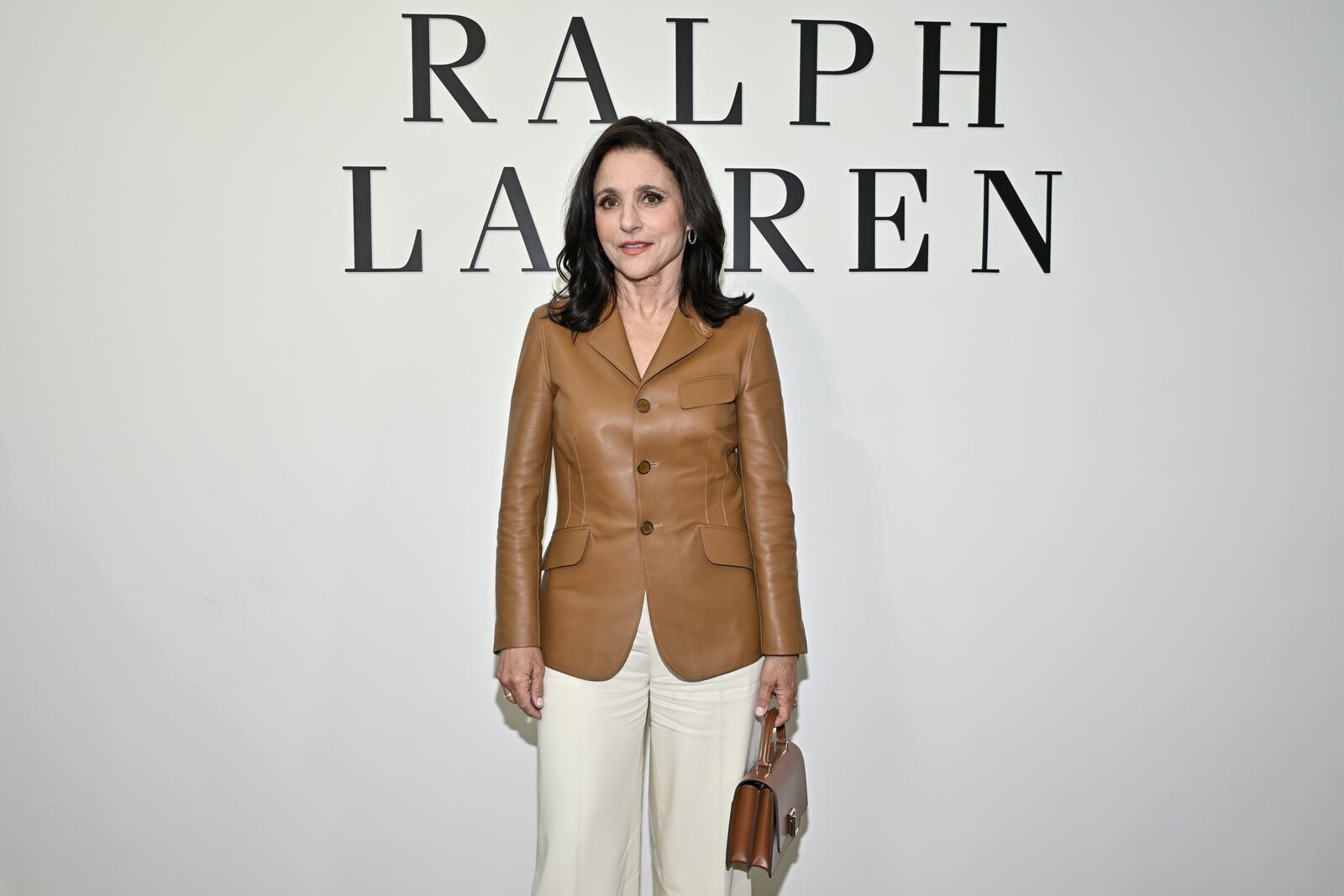 Julia Louis-Dreyfus arrives at the Ralph Lauren Fall 2025 presentation on Thursday, April 17, 2025, in New York. (Photo by Evan Agostini/Invision/AP)