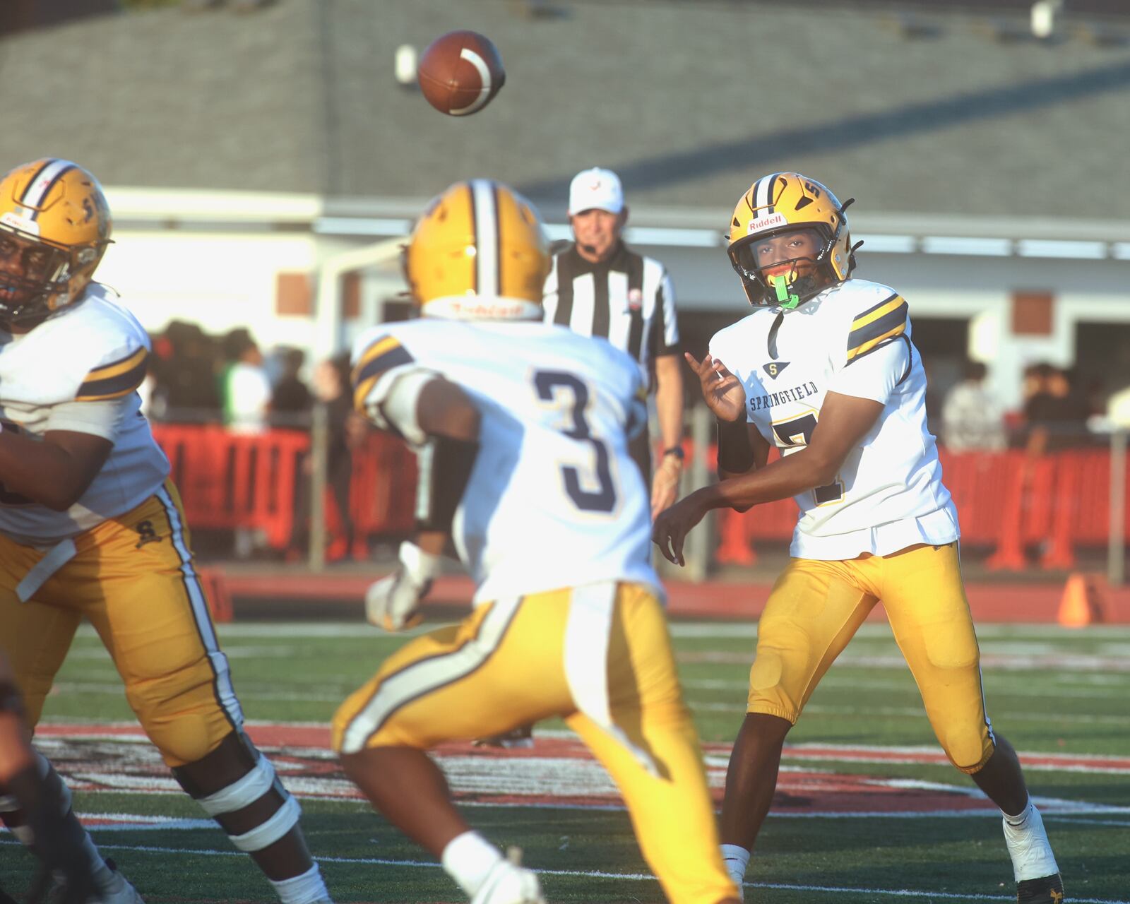 Springfield's Christopher Wallace throws a pass against Wayne on Friday, Oct. 3, 2025, at Heidkamp Stadium in Huber Heights. David Jablonski/Staff