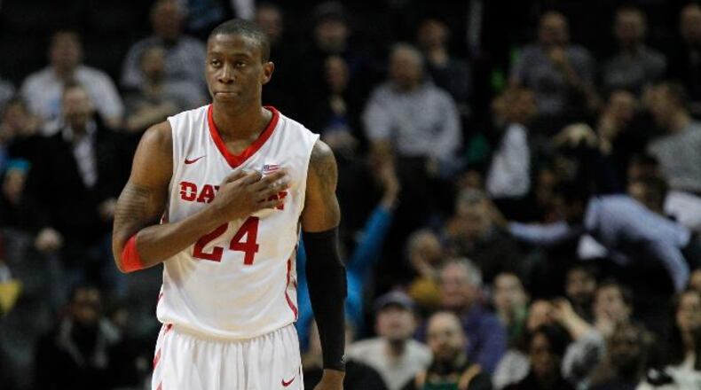 Dayton’s Jordan Sibert celebrates after hitting a go-ahead 3-pointer with 1:09 remaining against St. Bonaventure in the quarterfinals of the Atlantic 10 tournament on Friday, March 13, 2015, at the Barclays Center in Brooklyn, N.Y. David Jablonski/Staff
