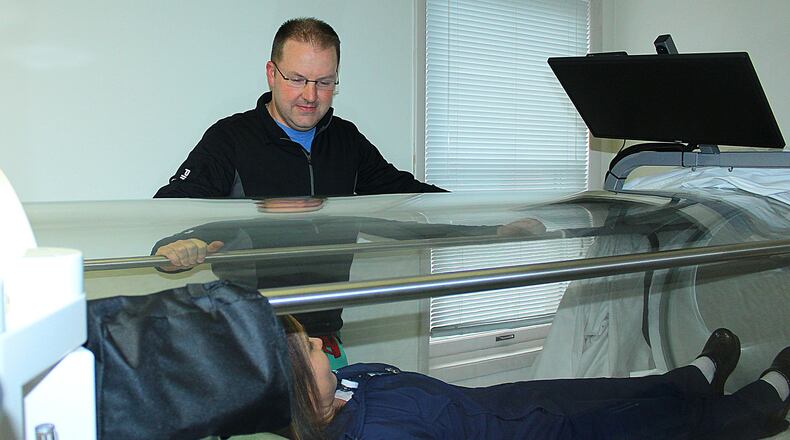 Dr. Eric Anderson a physician with Mercy Health s Wound Care Centers demonstrates Hyperbaric Oxygen Therapy for Wound Healing. JEFF GUERINI/STAFF